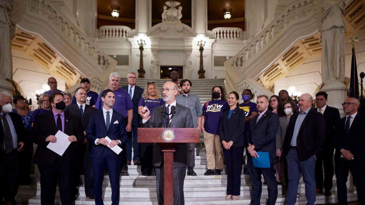 Gov. Tom Wolf, flanked by advocates for nursing home operators and workers, in July celebrated the $600 million investment in long-term care facilities.