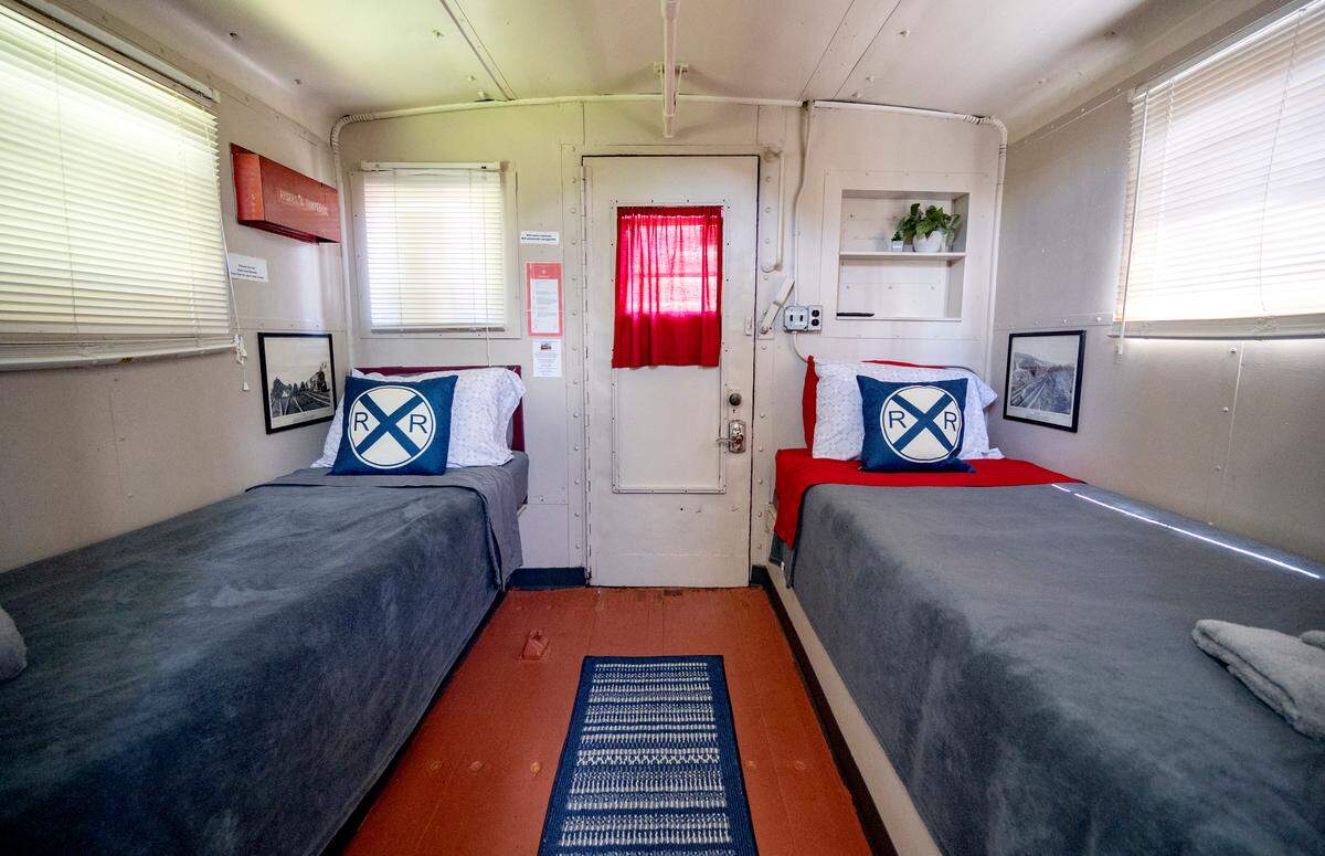 There are two single beds in the 1941 caboose at the Castanea Railroad Station that visitors can stay in.
