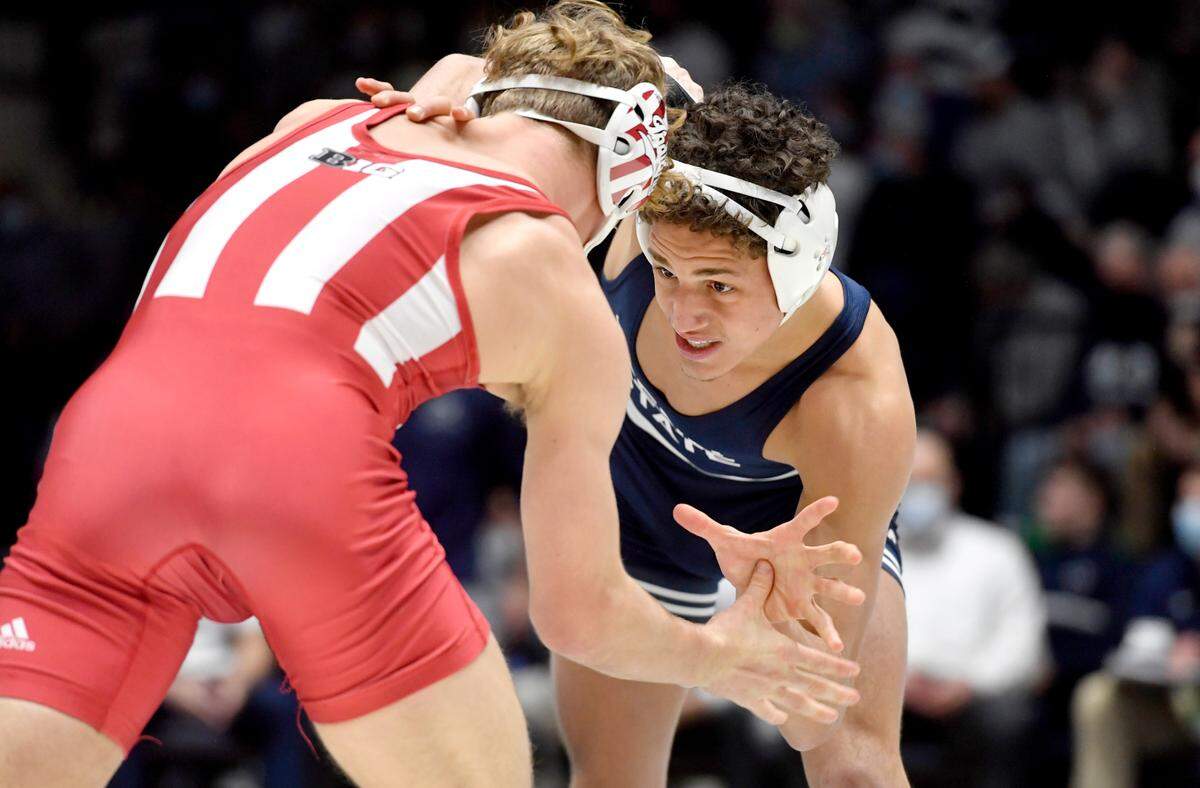 Penn State’s Tony Negron wrestles Indiana’s Derek Gilcher in the 157 lb bout during the match on Jan. 9.
