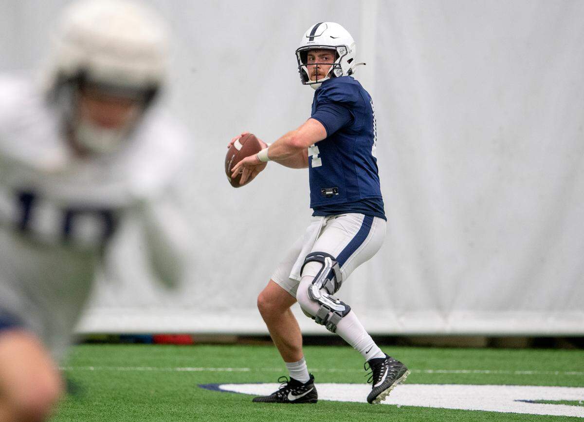 Penn State quarterback Sean Clifford makes a pass during practice on Friday, Dec. 17, 2021.
