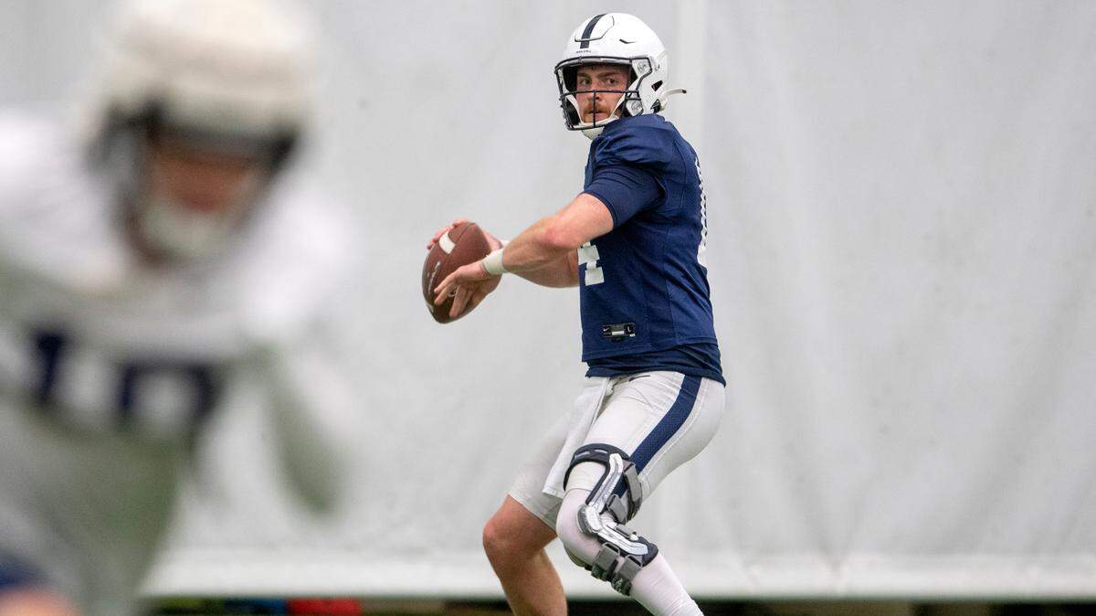 Penn State quarterback Sean Clifford makes a pass during practice on Friday, Dec. 17, 2021.