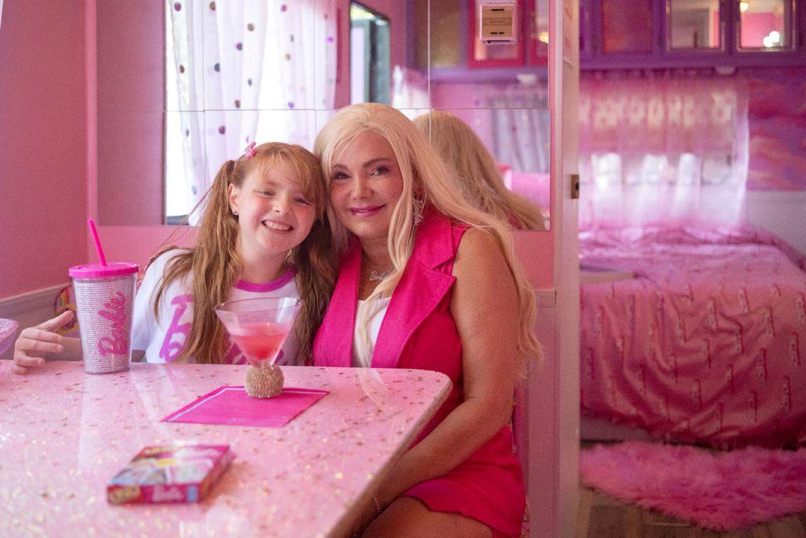 Jazmyn “Jazzy” and Wendy Krammes enjoy pink lemonade in their Barbie camper on Friday, July 14, 2023.