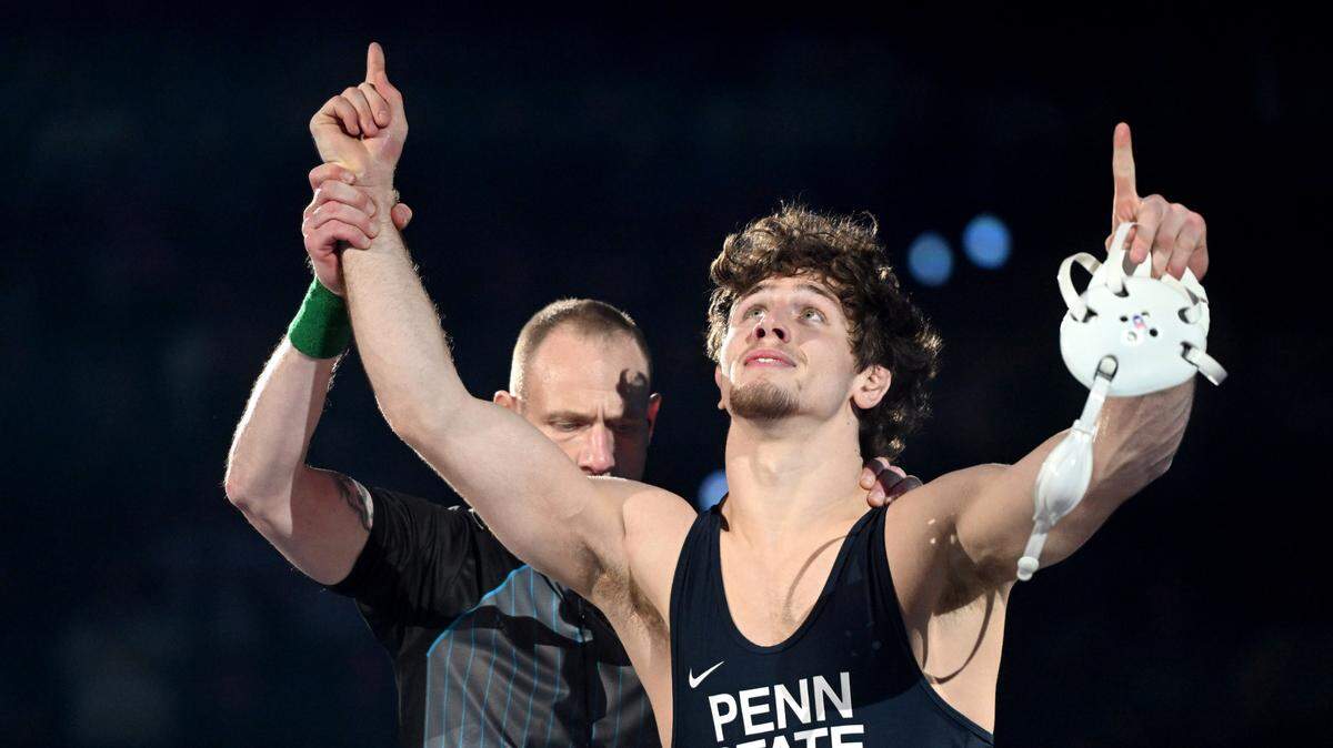 Penn State’s Levi Haines celebrates his pin of Michigan’s Joseph Walker in the 174 lb bout of the match on Friday, Feb. 7, 2025 in the Bryce Jordan Center.