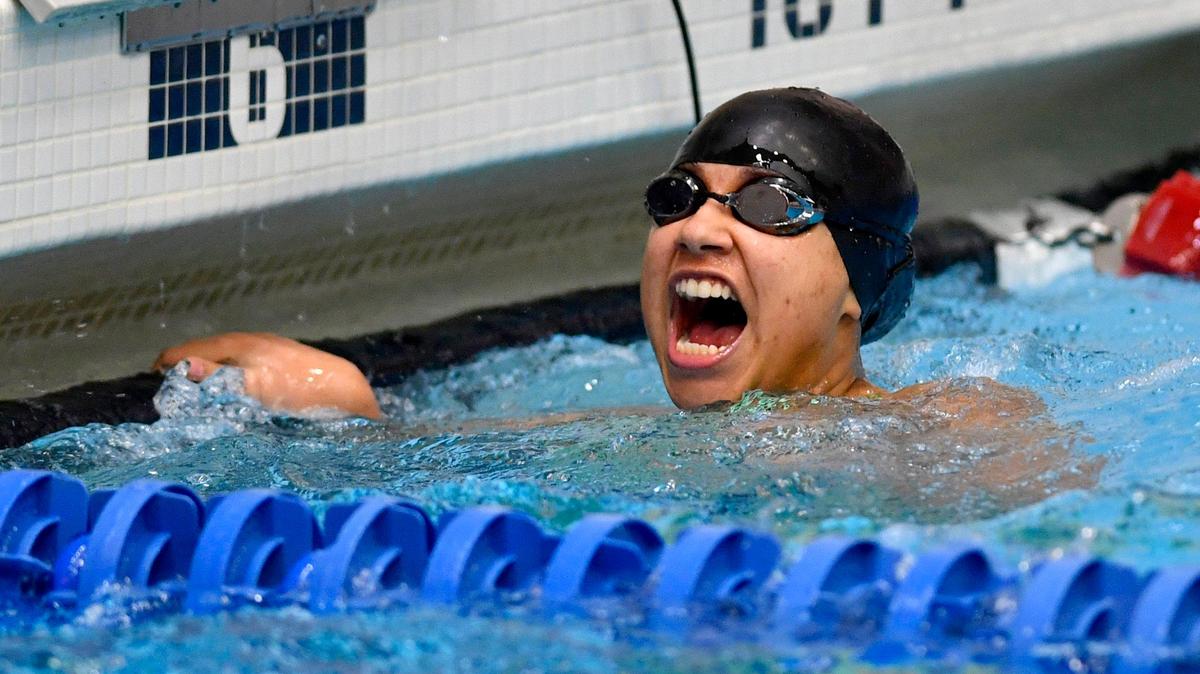 Bald Eagle Area’s Alaina Cane celebrates finishing in third with a time of 25.72 in the girls AA 50 yard freestyle during the District 6 swimming championships on Friday, Feb. 28, 2020.