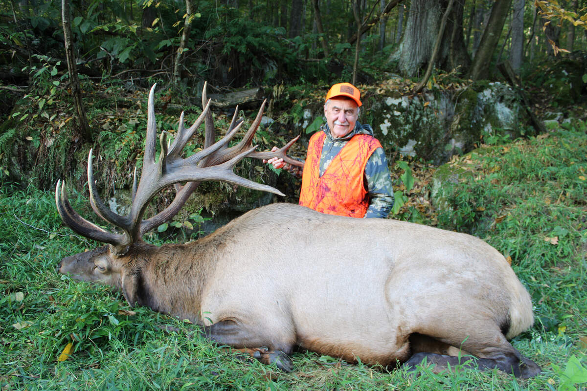 Louis Breland with his massive EHZ 12 Governor’s Tag bull elk.