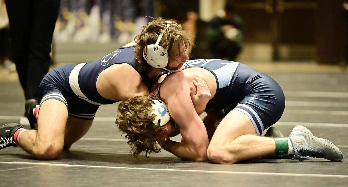Penn State’s Timothy Levine fights off a shot attempt from Columbia’s Boris Witmer, who is a St. Joseph’s Catholic Academy grad, in their 133-pound quarterfinals match of the Black Knight Invitational on Sunday in West Point, NY. Witmer, who was known as Zack in high school, defeated Levine, 14-2.