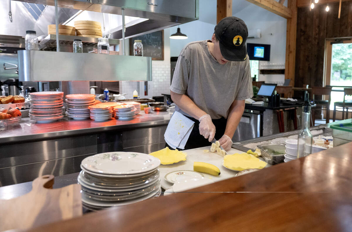 Vlad Perry makes a banana and peanut butter crepe at Fillmore Farm Cafe & Gardens on Wednesday, July 8, 2026.