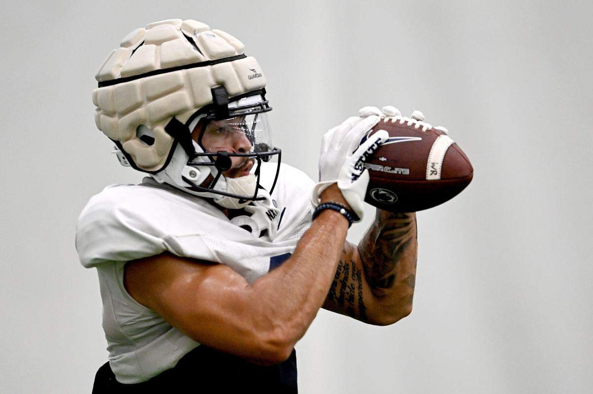Penn State wide receiver Julian Fleming makes a catch during practice on Saturday, Aug. 3, 2024.