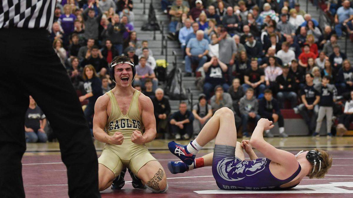 Bald Eagle Area’s Gage McClenahan celebrates defeating Mifflin County’s Trey Kibe in the 152 pounds final during the PIAA Regional Wrestling Finals Saturday, March, 3, 2018 at Altoona Area High School.