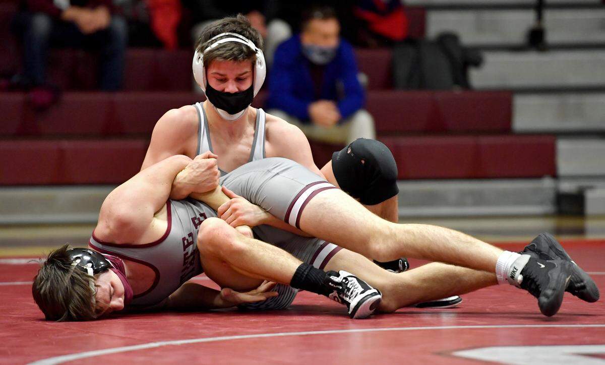 BellefonteÕs Jude Swisher controls State CollegeÕs Kyle Martin in the 145 lb bout of the District 6 3A team championships on Thursday, March 18, 202.