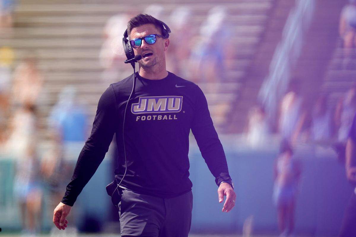 CHAPEL HILL, NORTH CAROLINA - SEPTEMBER 21: Head coach Bob Chesney of the James Madison Dukes watches his team play against the North Carolina Tar Heels during the second half of the game at Kenan Memorial Stadium on September 21, 2024 in Chapel Hill, North Carolina. The Dukes won 70-50. (Photo by Grant Halverson/Getty Images)