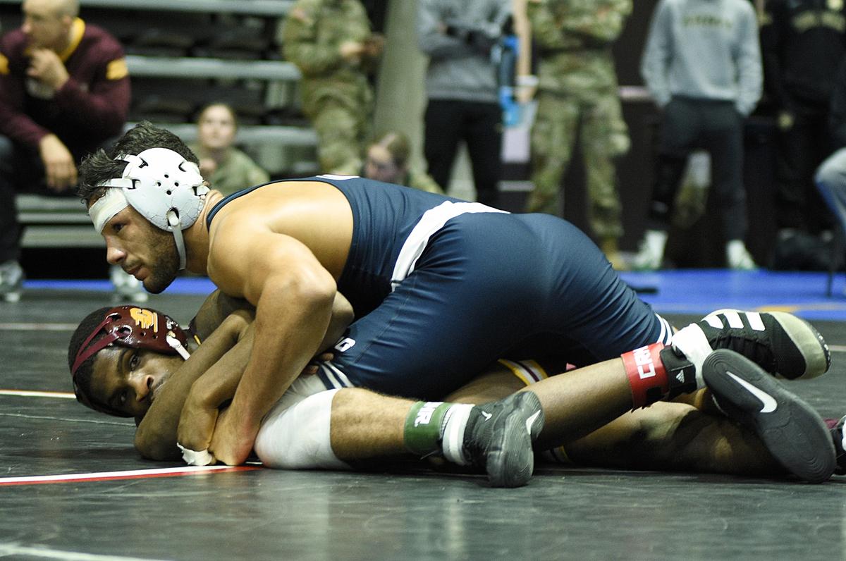 Penn State’s Shayne Van Ness controls Central Michigan’s Johnny Lovett in their 149-pound Black Knight Invite championship match on Sunday at West Point, N.Y. Van Ness topped Lovett, 5-3.
