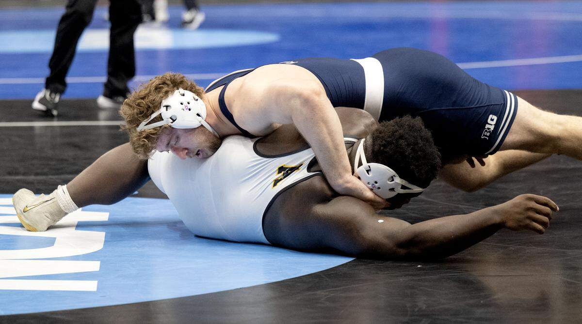 Penn State's Cole Mirasola controls Stephen Monchery in a 285-pound bout at the NCAA wrestling championships on Friday, March 20, 2026.  
