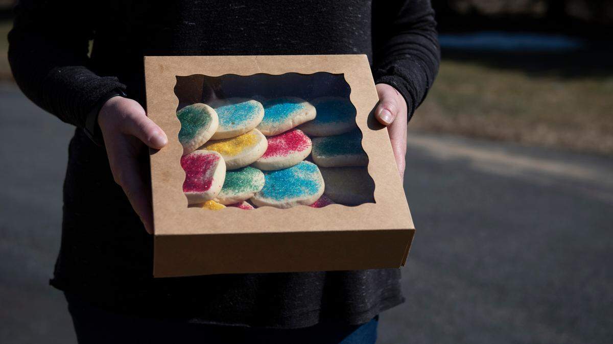 Jessica Roth holds cookies she baked for Cookies for Caregivers on Wednesday in Centre Hall.