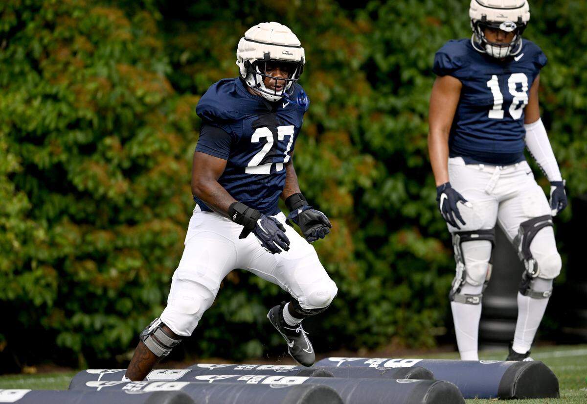 Penn State defensive end Ken Talley runs a drill during practice on Wednesday, Aug. 10, 2022.