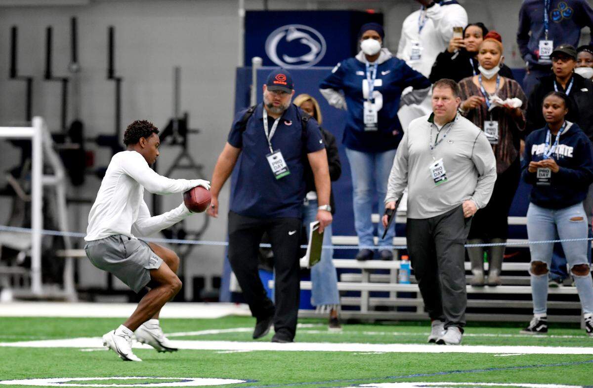 Wide receiver Jahan Dotson makes a catch as NFL scouts and his family watch during Penn State pro day on Thursday, March 24, 2022.
