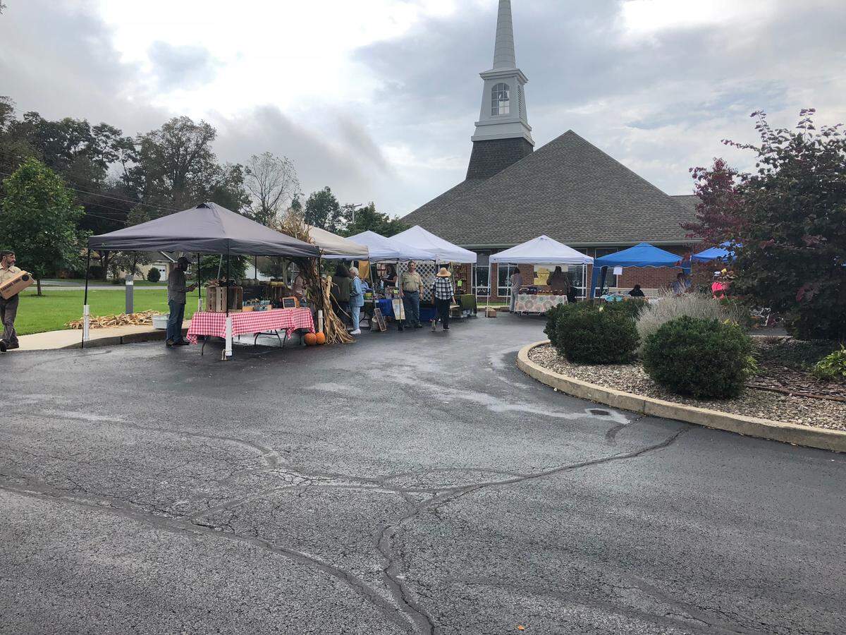 Vendors start to pack up their booths at the Pine Grove Mills Harvest Fest on Saturday.