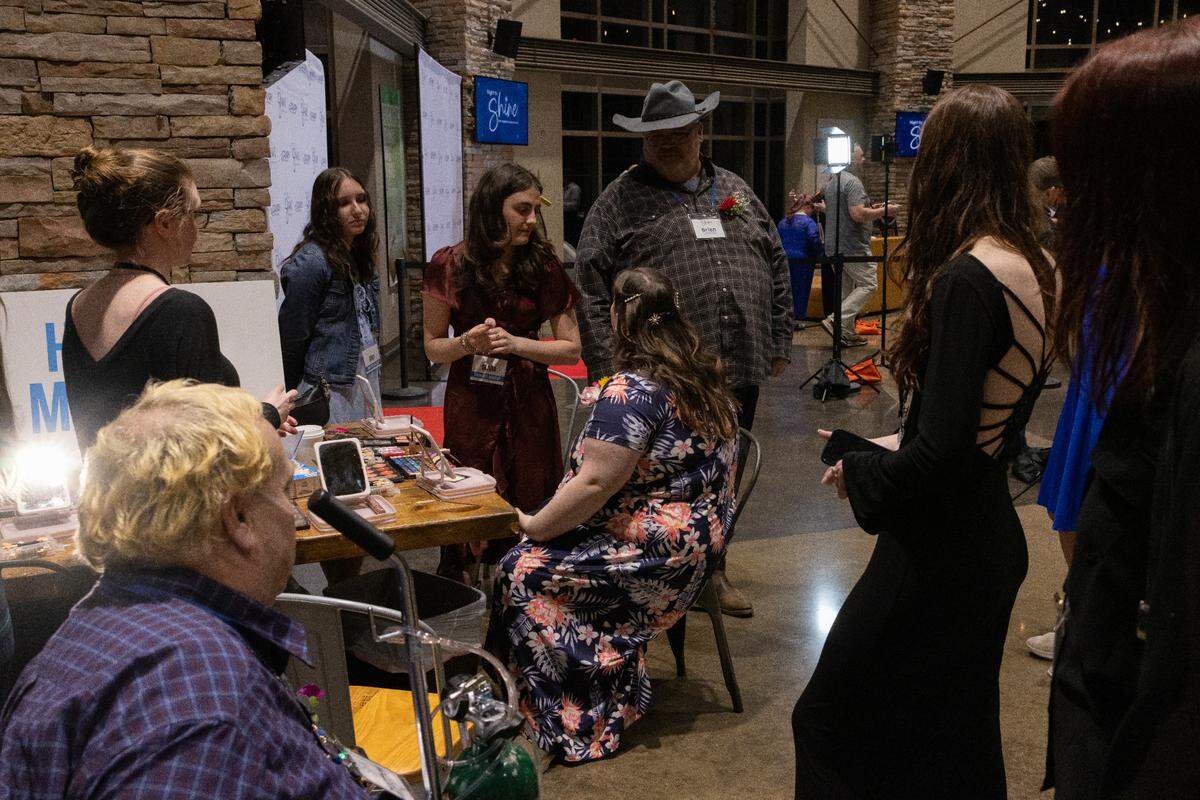 Guest talk as they have hair and makeup done at Night to Shine on Friday, Feb. 7, 2025.
