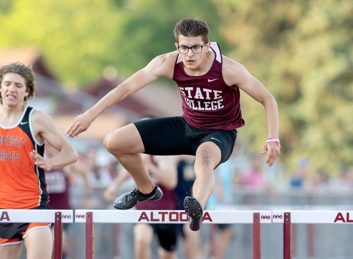 State CollegeÕs Ryan Lindenberg wins the 300 meter hurdles at the District 6 3A track and field championships at Mansion Park on Thursday, May 20, 2021.