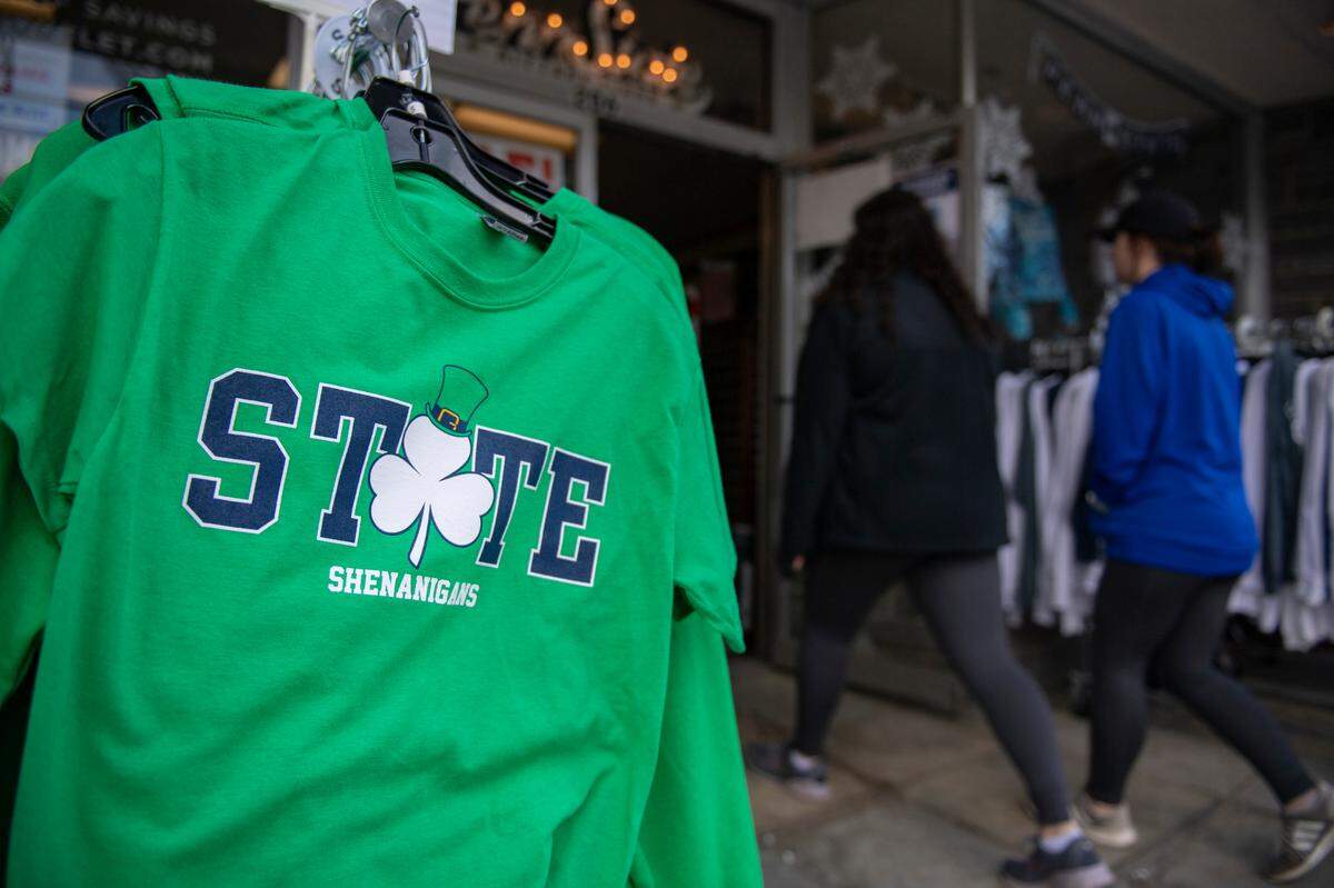 A State Patty’s Day themed shirt is displayed outside of Lion & Cub on Feb. 23, 2022 in State College, Pa. State Patty’s Day is a student-created alternative to the traditional Saint Patrick’s Day, which originally fell on Penn State’s spring break.