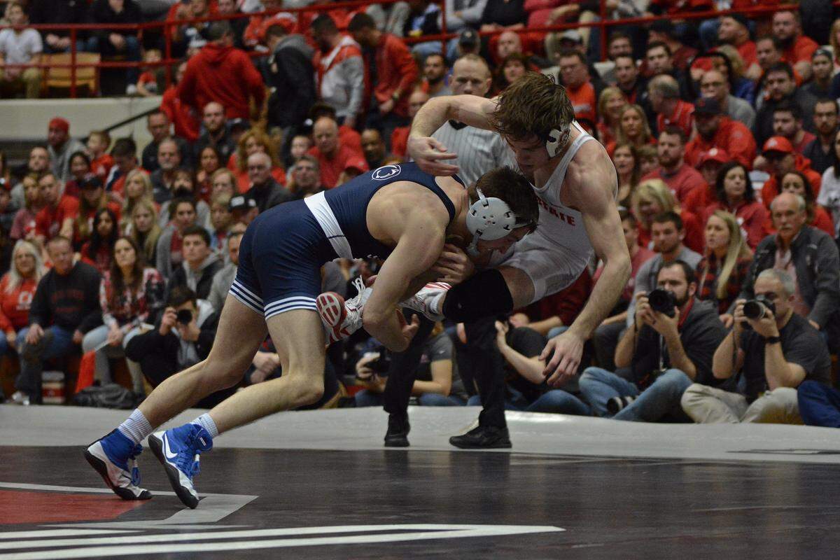Penn State’s Nick Lee takes down Ohio State’s Joey McKenna at 141 pounds on Friday at St. John Arena in Columbus, Ohio. Lee won by decision, 7-6.