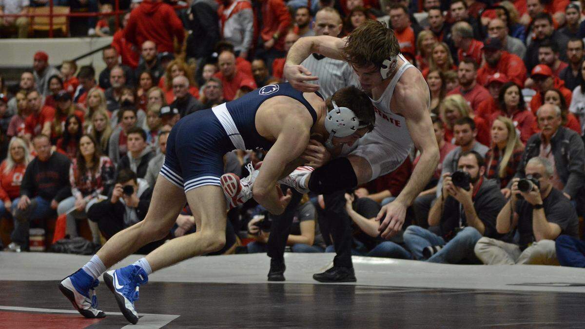 Penn State’s Nick Lee takes down Ohio State’s Joey McKenna at 141 pounds on Friday at St. John Arena in Columbus, Ohio. Lee won by decision, 7-6.
