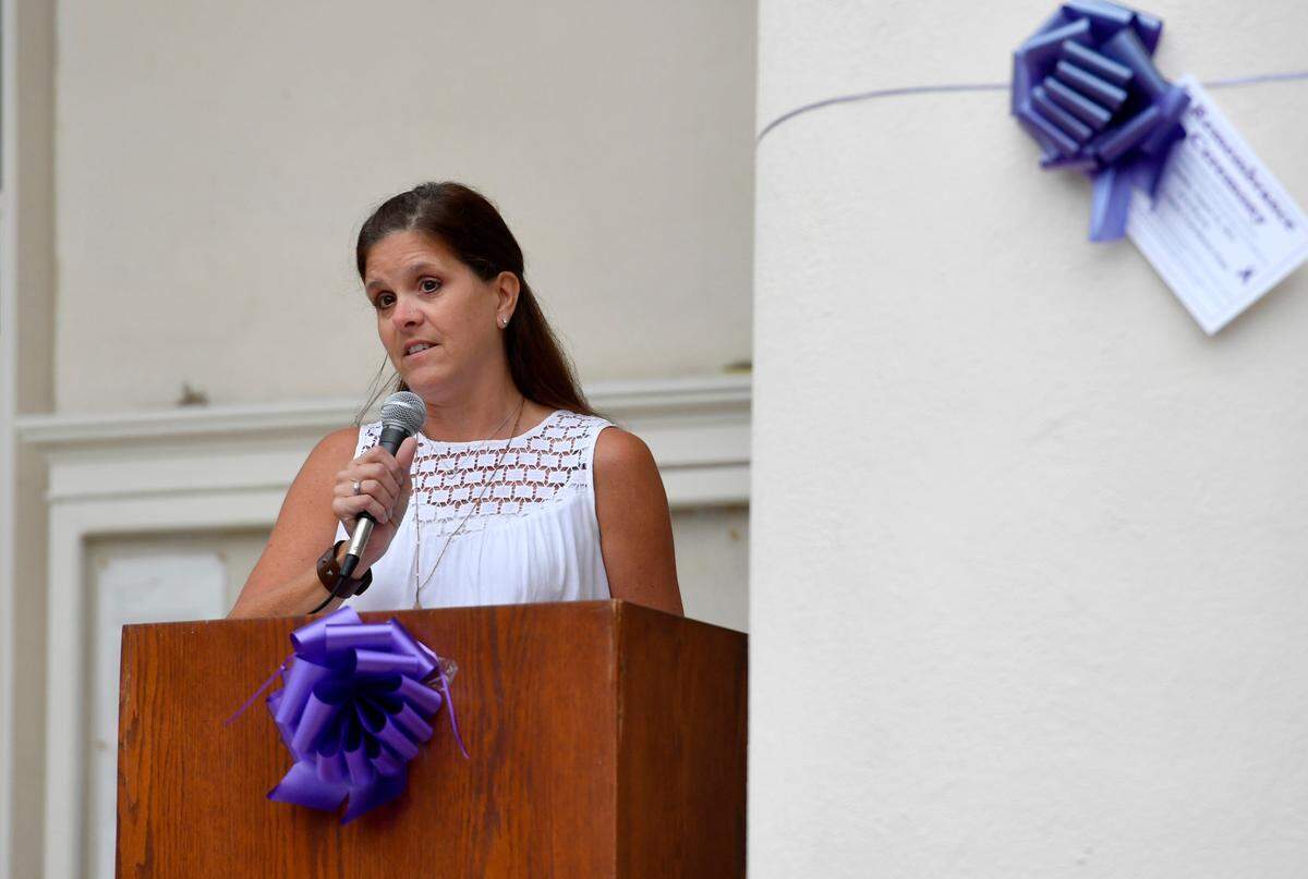 Denis McCann speaks during the Centre County HOPE Initiative’s candlelight remembrance ceremony on Tuesday.