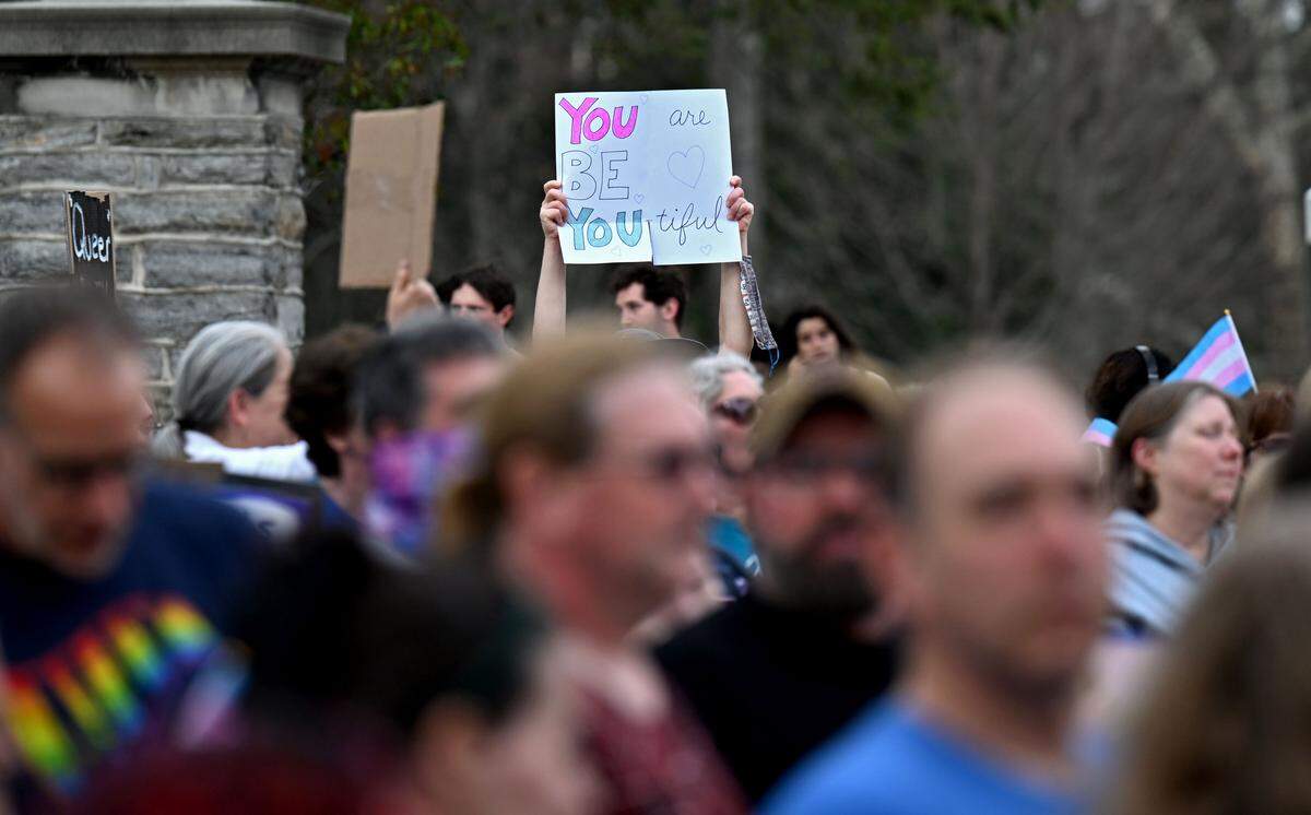 A crowd gathered at the Allen Street Gates for the Transgender Day of Visibility rally hosted by the Centre LGBT+ on Tuesday, March 31, 2026.  