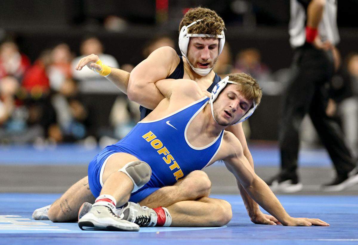 Penn State’s Mitchell Mesenbrink controls Hofstra’s Kyle Mosher in a 165-pound bout during the 2025 NCAA Wrestling Championships in Philadelphia on Thursday, March 20, 2025.