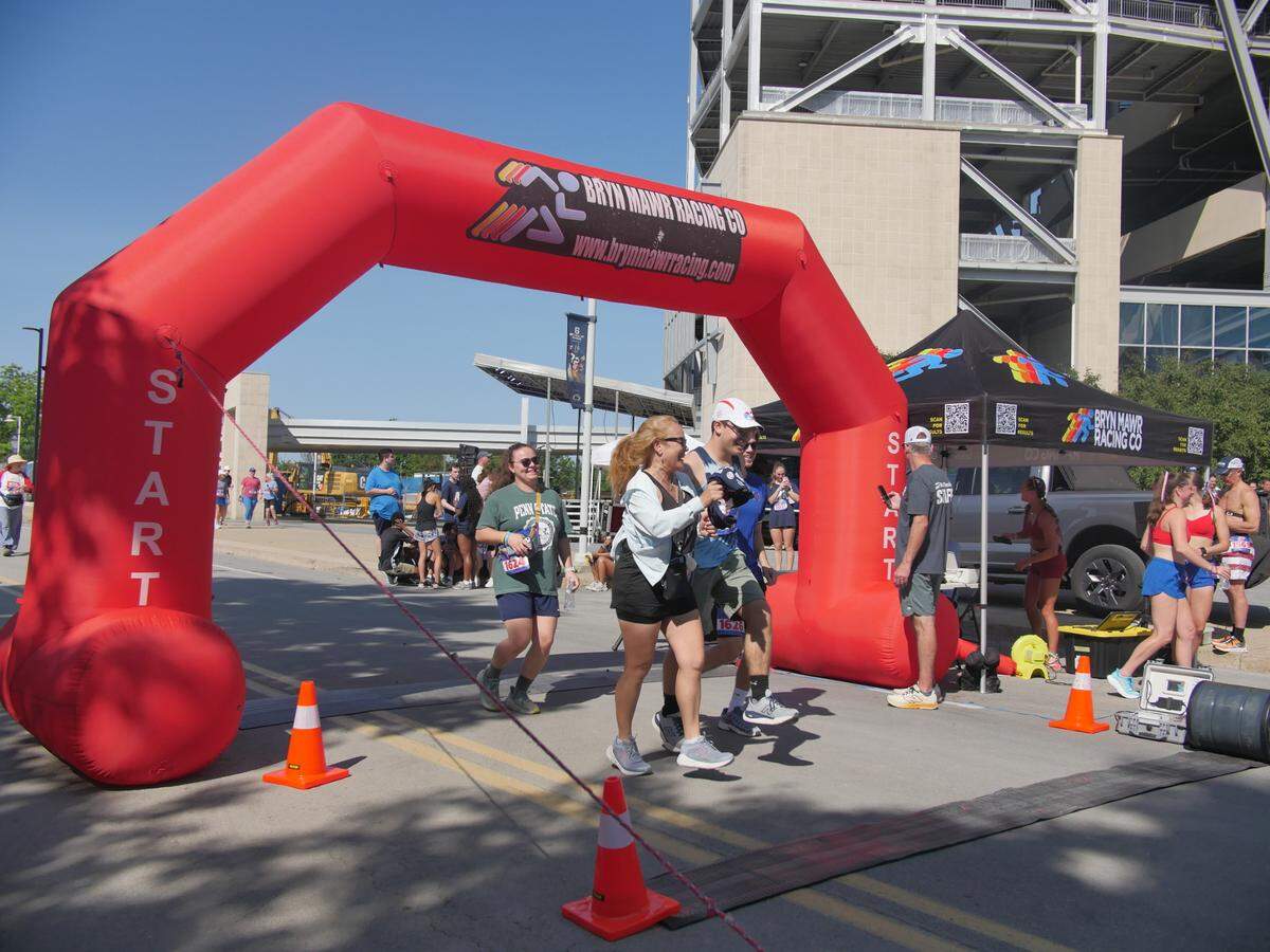 The Firecracker 4K kicked off the Central PA 4th Fest celebration on July 4, 2025. Attendees gathered at the finish line while others applauded those who followed.