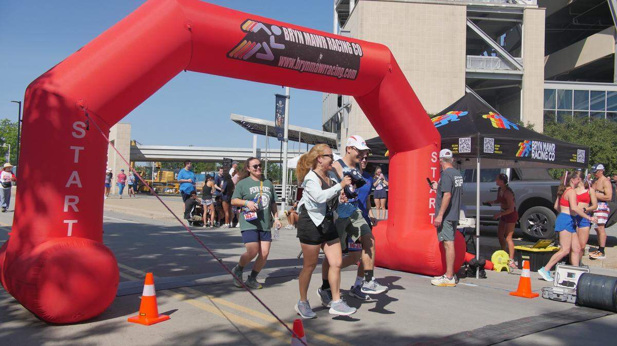 The Firecracker 4K kicked off the Central PA 4th Fest celebration on July 4, 2025. Attendees gathered at the finish line while others applauded those who followed.