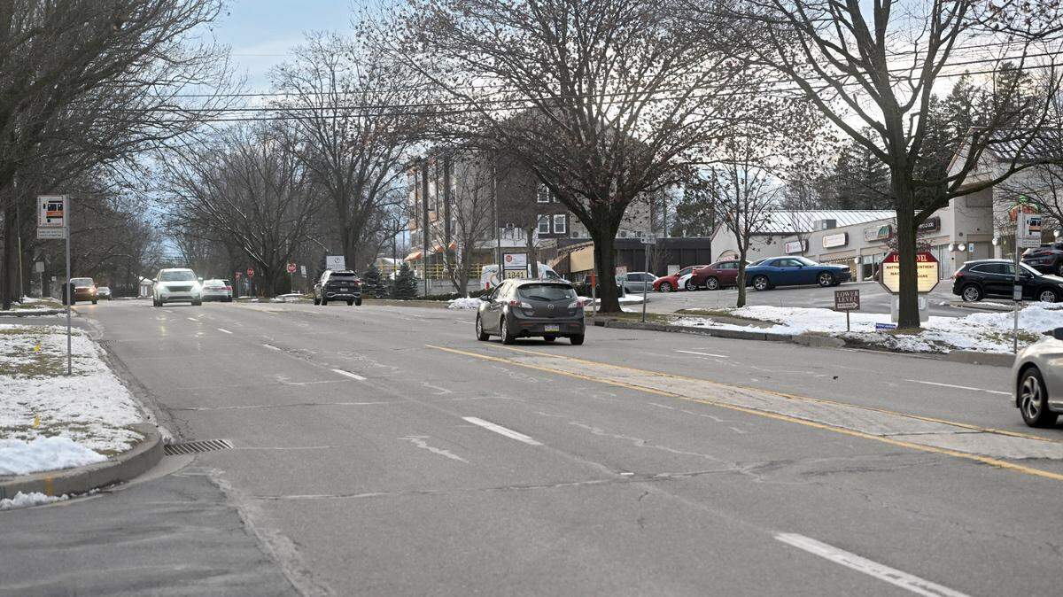 Traffic moves through the four lanes of South Atherton Street on Tuesday, Feb. 13, 2024.