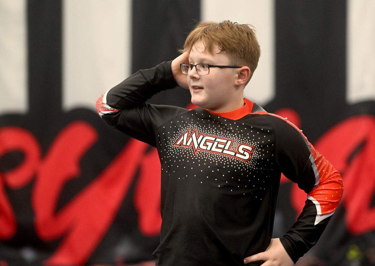Slade Thompson and his fellow Fame Angels teammates practice their routine on Tuesday, March 12, 2024.