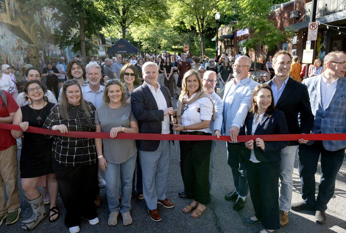Jonathan Friedman of Comet Properties LLC and Lee Anne Jeffries, executive director of the Downtown State College Improvement District, cut the ribbon for East End Social on Thursday, May 28, 2026. 