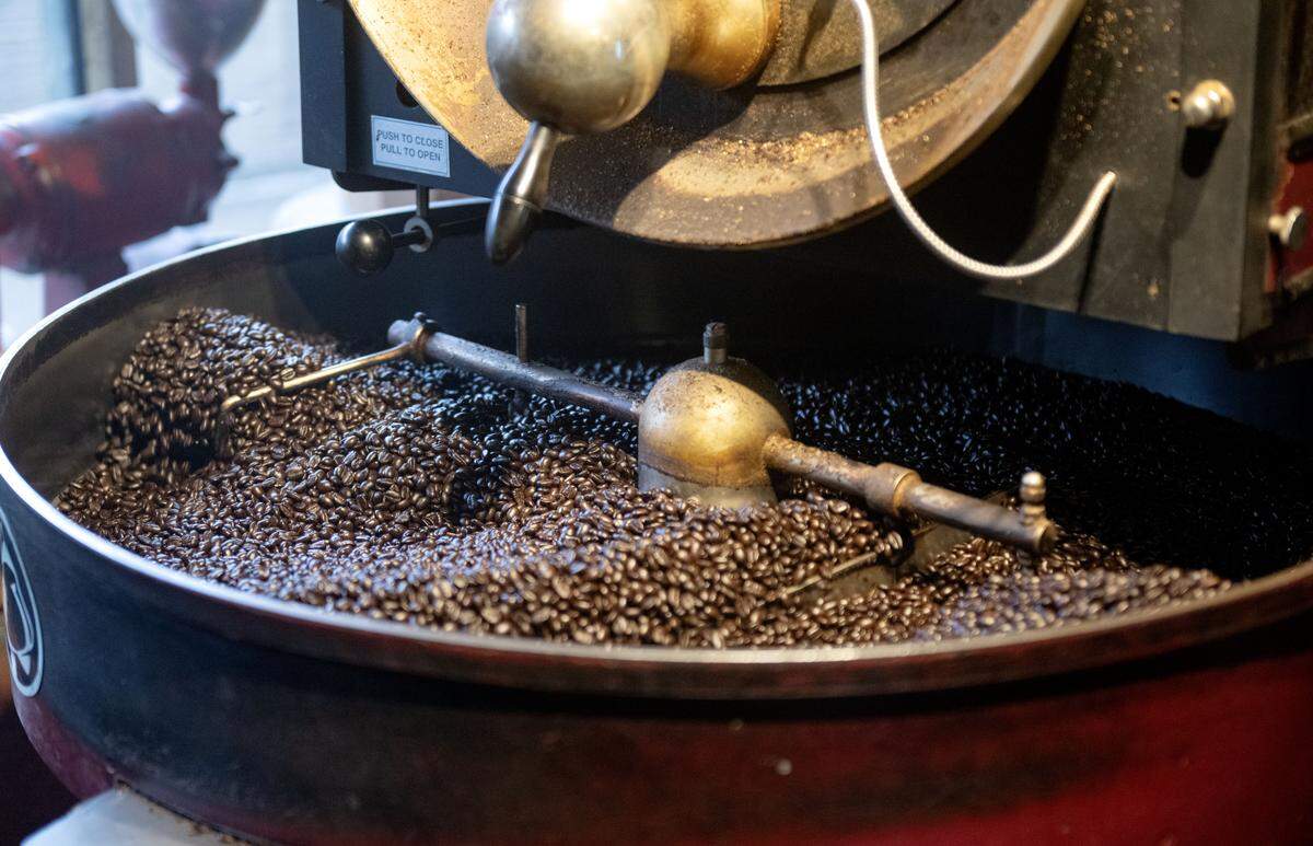 A batch of coffee beans roast at The Cheese Shoppe on Wednesday, March 4, 2026. 