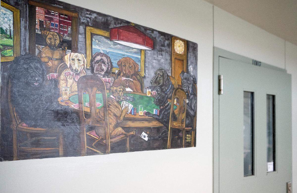 Paintings of dogs are on the walls in Block E at SCI Rockview.