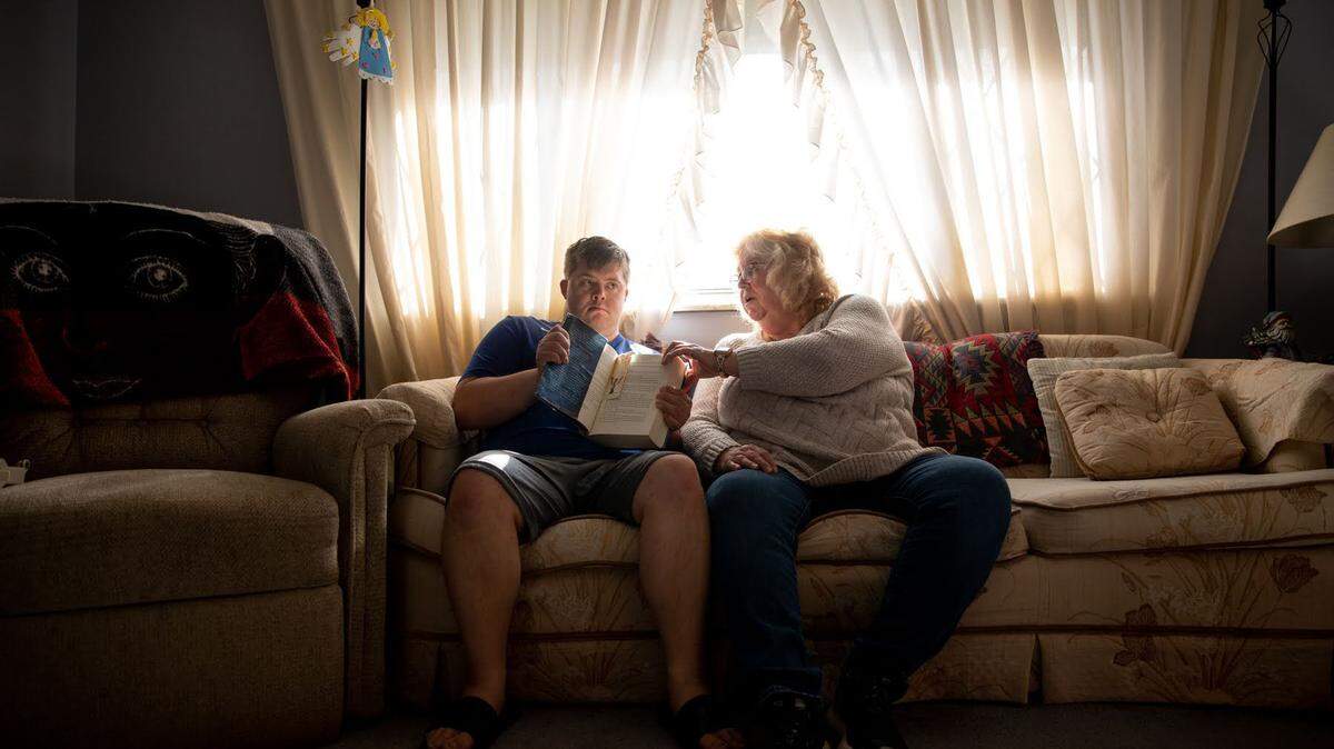 Lisa Stagon had to quit her job to care for her son, Chris, who is 26 and has Down syndrome.