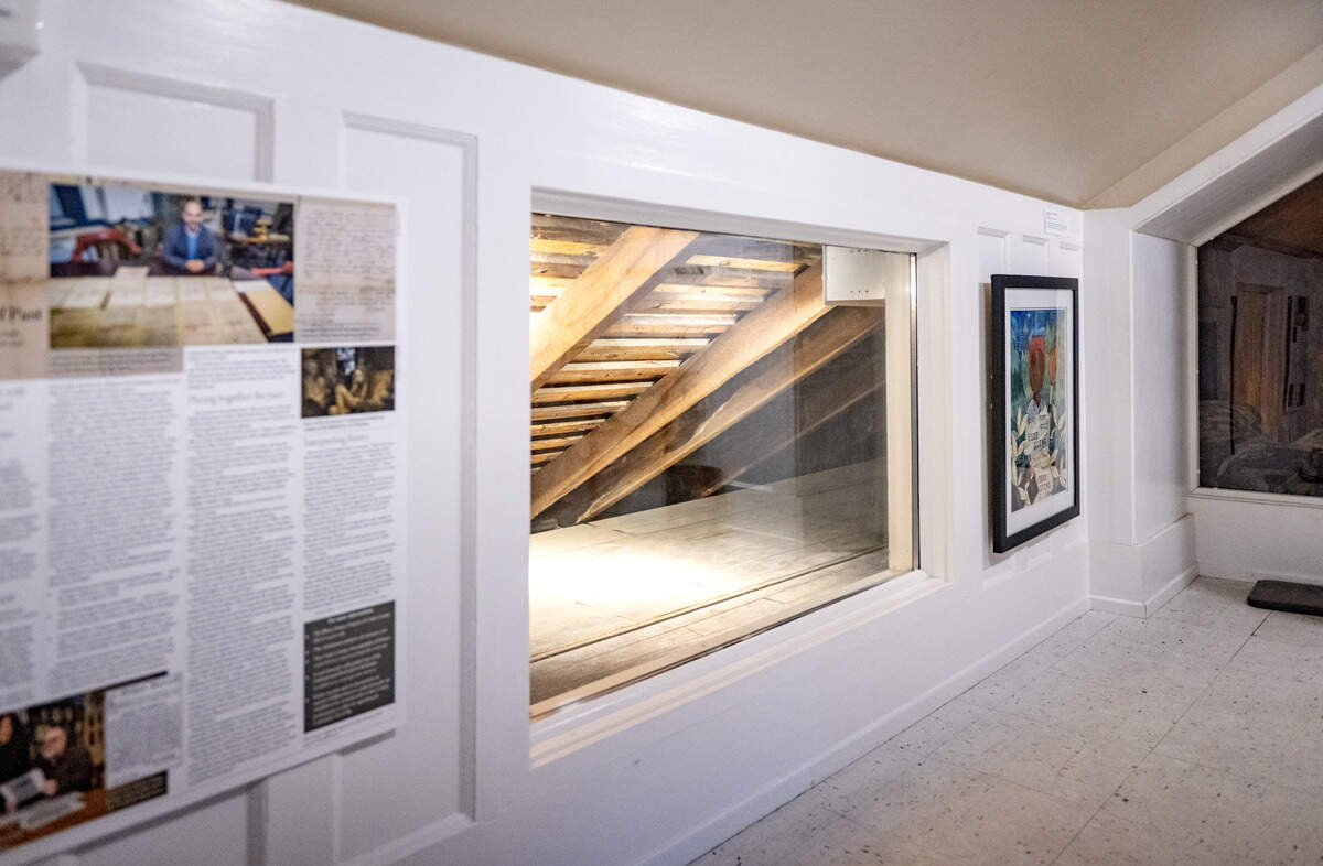 A window has been created to show how freedom seekers would crawl to a hidden room at the Bellefonte Art Museum exhibit, “A Journey to Freedom.”