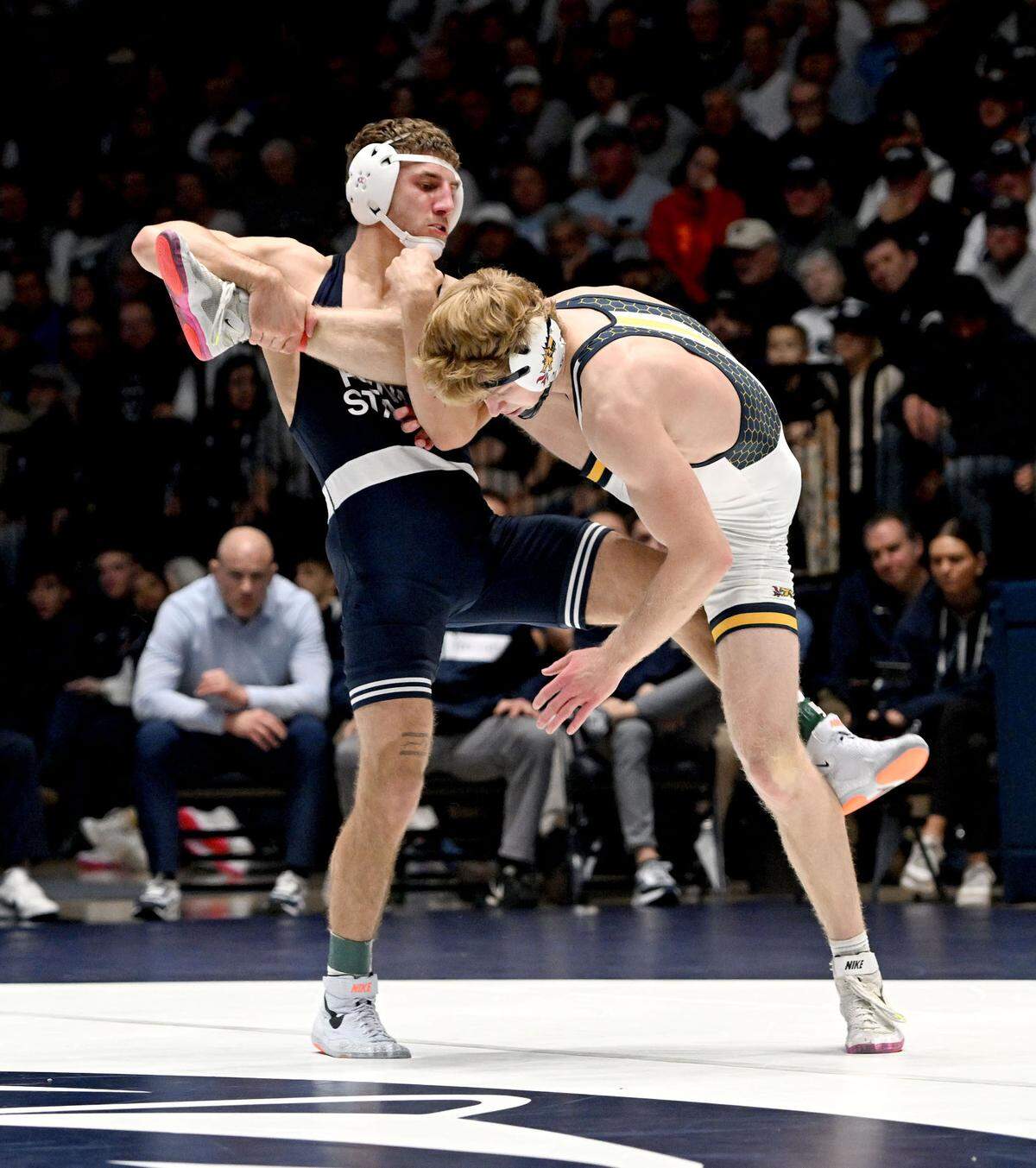 Penn State’s Mitchell Messebrink trips up Drexel’s Cody Walsh in the 165 lb bout of the match on Sunday, Nov. 17, 2024 at Rec Hall. Messenbrink won by tech fall at 5:19.