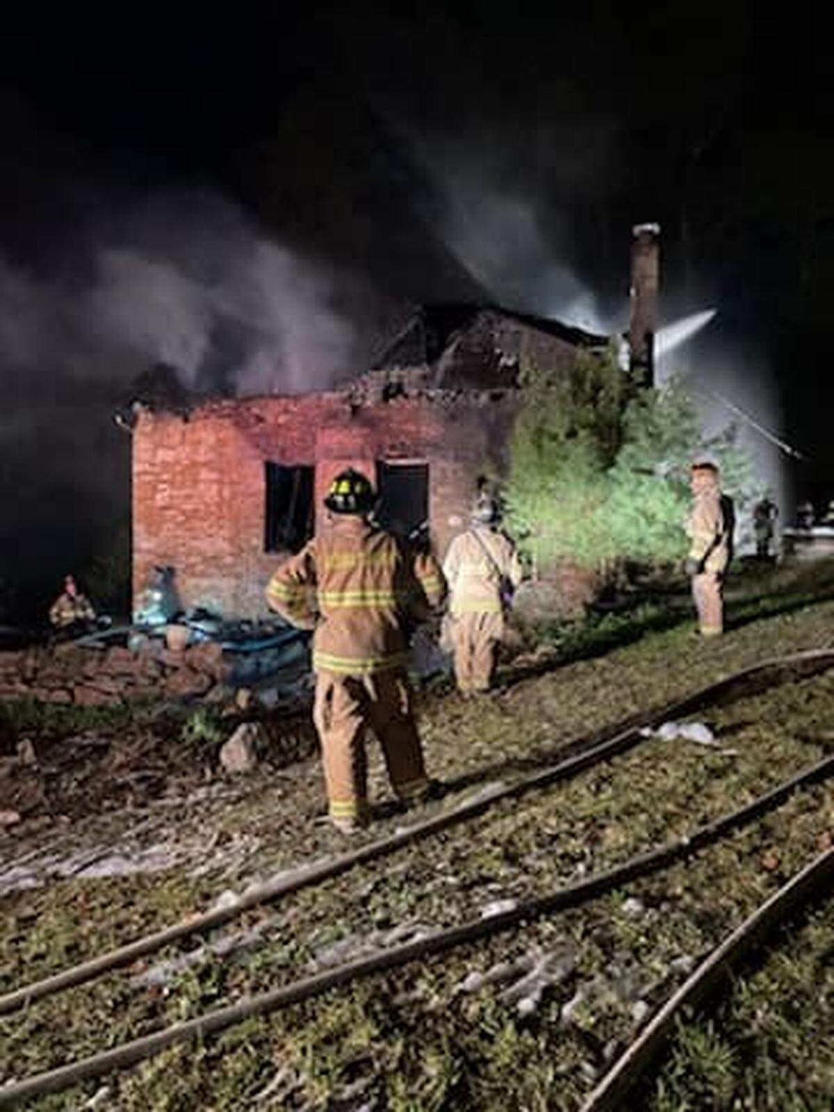 A fire that broke out Wednesday in the porch area of a house along the 700 block of Mountain Road in Harris Township destroyed a house that three adults were living in.