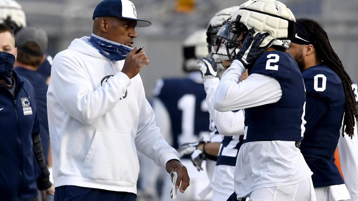 Penn State safeties coach Anthony Poindexter talks to players during practice on Friday, April 23, 2021 at Beaver Stadium.