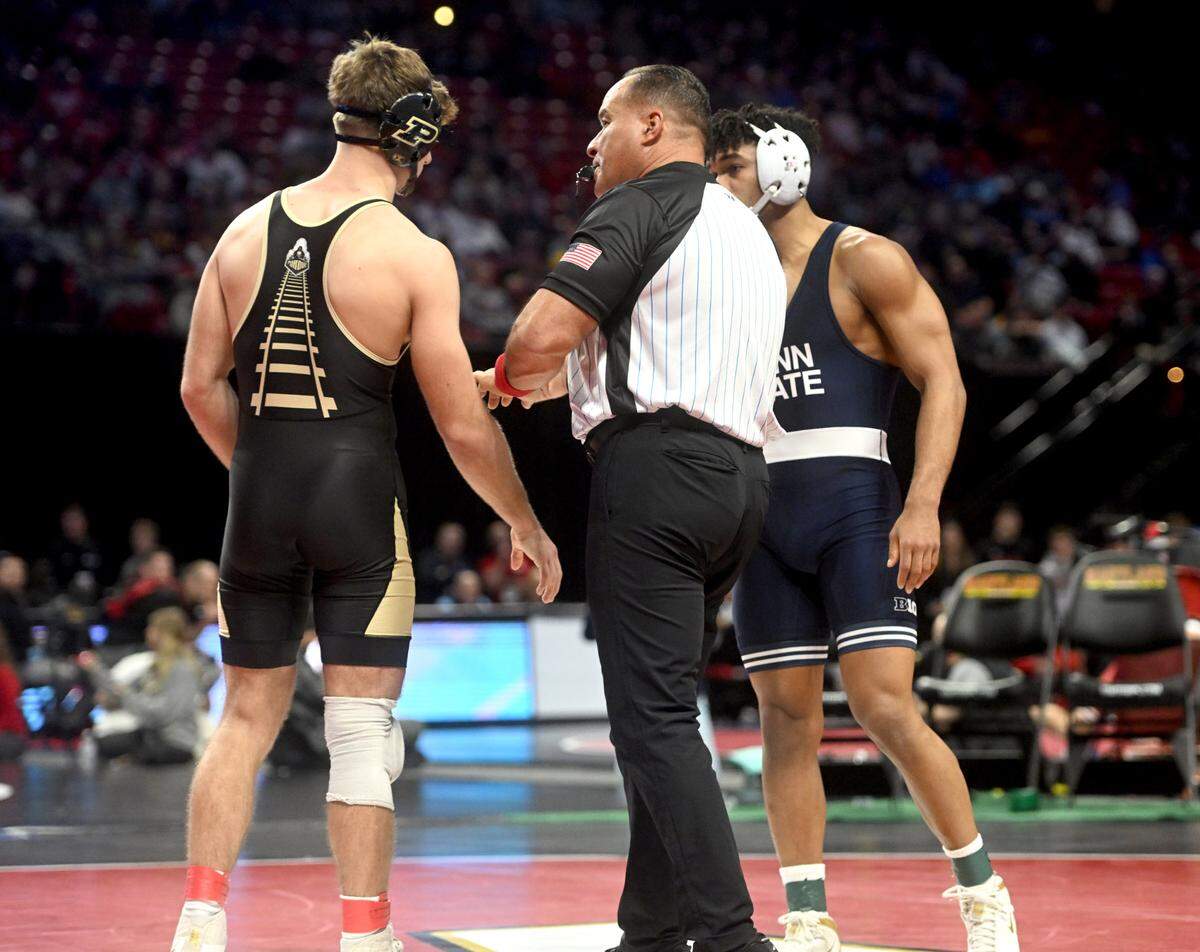 Penn State’s Carter Starocci injury-defaults his bout against Purdue’s Brody Baumann at the Big Ten Wresting Championships at the Xfinity Center at the University of Maryland on Saturday, March 9, 2024.