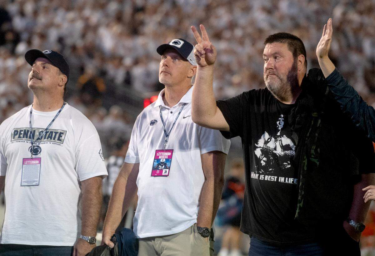 Members of the Penn State 1994 football team including Kerry Collins are honored during the game against Illinois on Saturday, Sept. 28, 2024.