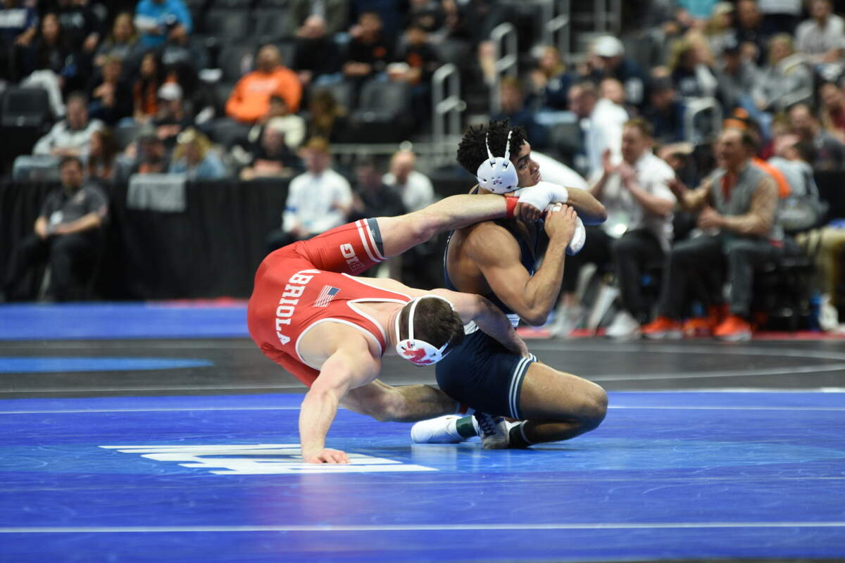 Penn State’s Carter Starocci scrambles with Nebraska’s Mikey Labriola during their 174-pound quarterfinals match of the NCAA Championships on Friday, March 18, 2022 at Little Caesars Arena in Detroit. Starocci won 6-1.
