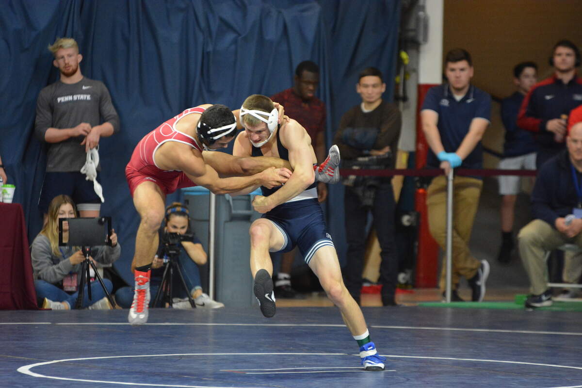 Penn State’s Jason Nolf, right, tried to trip Rider’s Gary Dinmore to the mat during their 157-pound quarterfinal match during the Keystone Classic on Sunday. Nolf topped Dinmore 22-10 and went on to win the title.