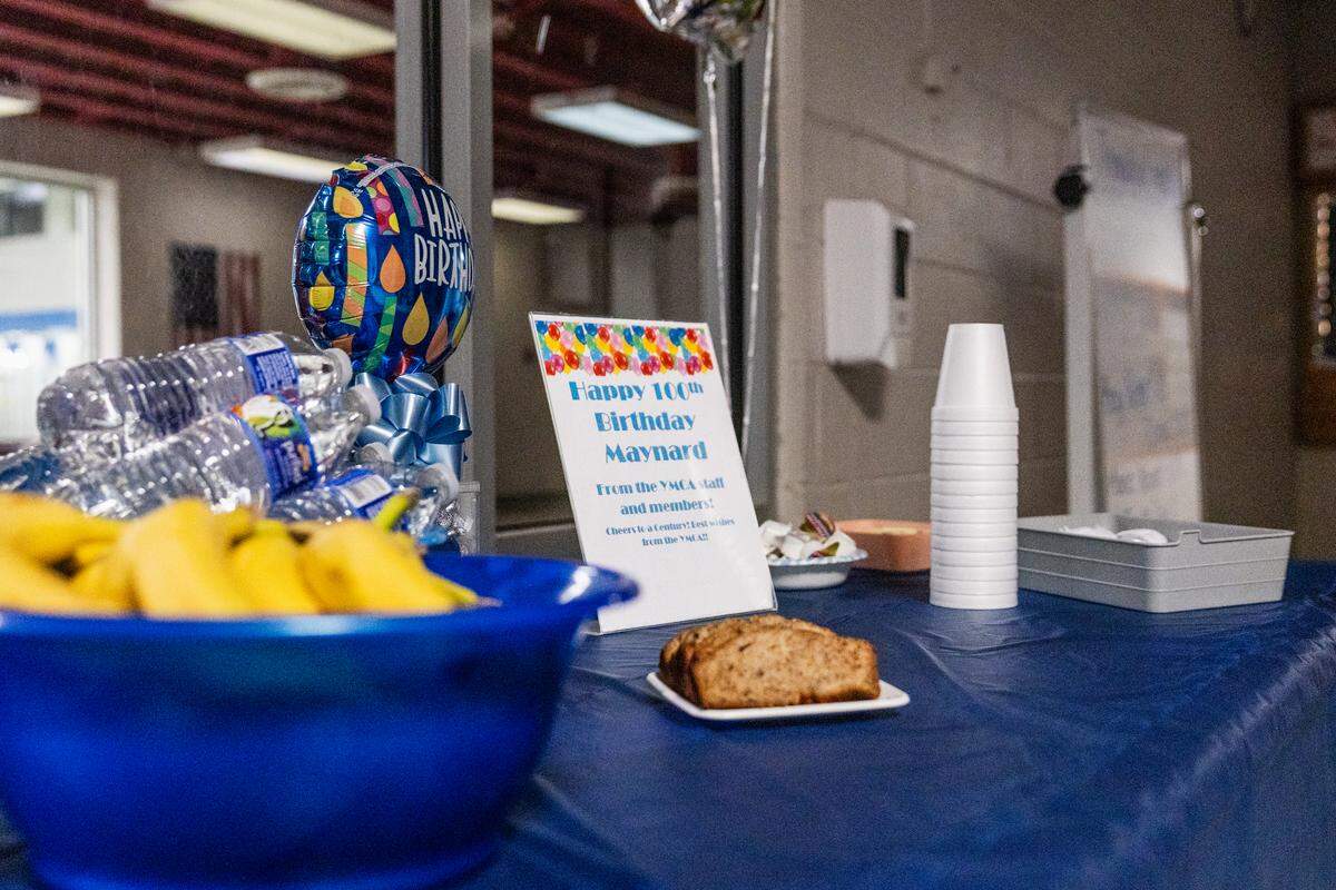 Drinks and snacks are laid out at the entrance of the State College YMCA for regular swimmer Maynard Kohler’s 100th birthday party on Friday, Jan. 23, 2026 in State College.