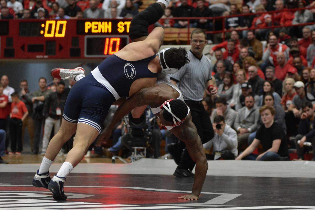 Penn State’s Vincenzo Joseph looks for the takedown against Ohio State’s Te’Shan Campbell at 165 pounds on Friday at St. John Arena in Columbus, Ohio. Joseph won by major decision, 11-2.