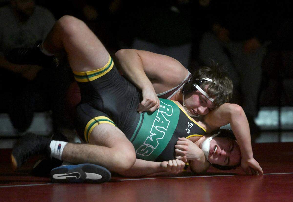 State College’s Carter Weaverling controls Central Dauphin’s Arthur Ruud in the 172 lb bout of the match on Wednesday, Dec. 14, 2022. Weaverling won by decision, 6-1.
