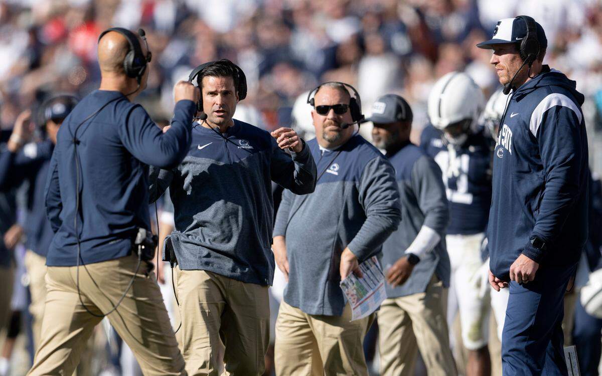 Penn State football coach James Franklin talks to defensive coordinator Manny Diaz during the game against Ohio State on Saturday, Oct. 29, 2022.