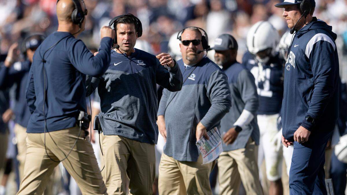 Penn State football coach James Franklin talks to defensive coordinator Manny Diaz during the game against Ohio State on Saturday, Oct. 29, 2022.